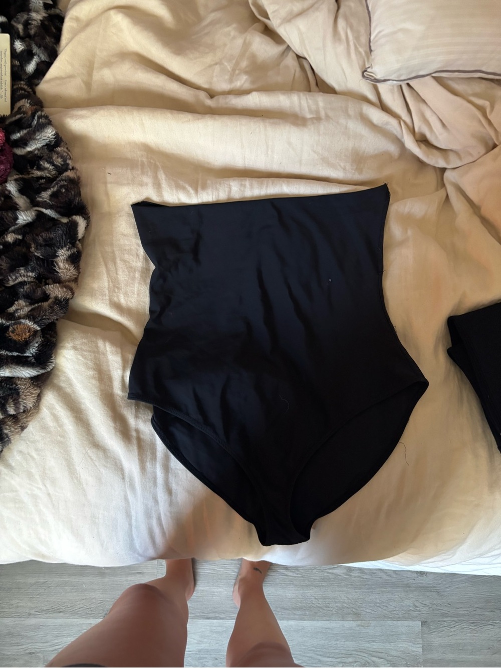 Reformation High-Waisted Black swim bottoms. Made to roll or fold down
